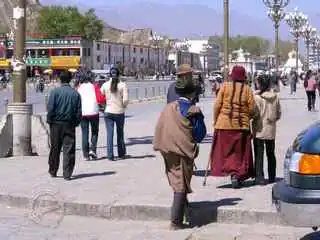 people on pilgrimage in lhasa