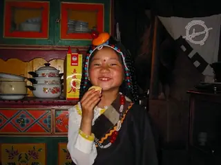 Tibetan young lady in traditional attire